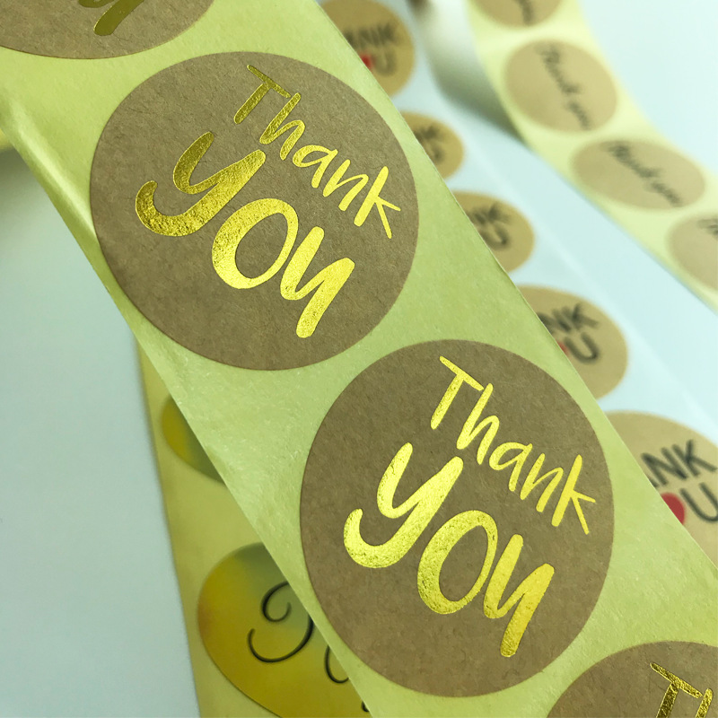 ملصق لاصق من الورق المطلي