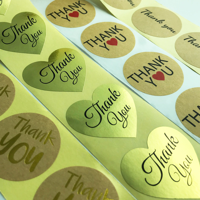 ملصق لاصق من الورق المطلي